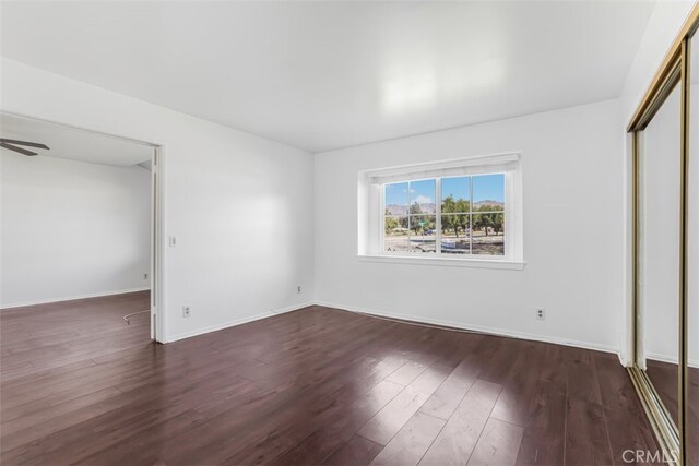 6304 Tamarind St, Oak Park, CA 91377 - unfurnished bedroom with wood finished floors and a closet