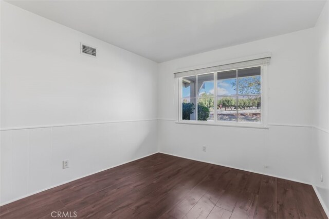 6304 Tamarind St, Oak Park, CA 91377 - empty room featuring dark wood-style floors