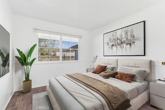 6304 Tamarind St, Oak Park, CA 91377 - bedroom featuring wood finished floors and baseboards