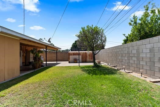 17059 E Groverdale St, Covina, CA 91722 - fenced backyard with a patio area