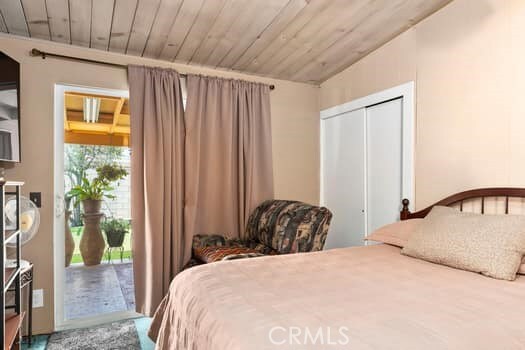 17059 E Groverdale St, Covina, CA 91722 - bedroom with access to outside, a closet, and wood ceiling