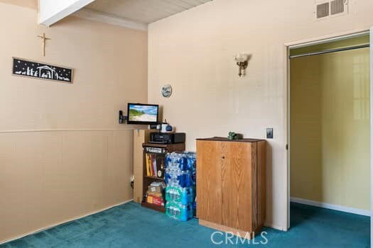 17059 E Groverdale St, Covina, CA 91722 - unfurnished bedroom featuring carpet and beamed ceiling