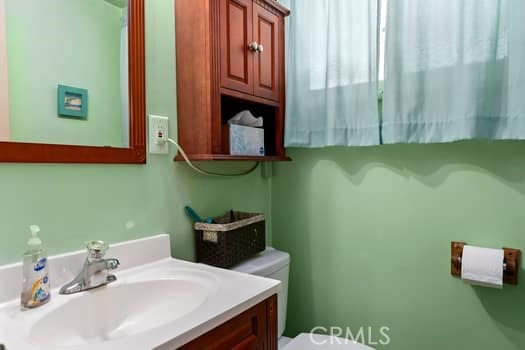 17059 E Groverdale St, Covina, CA 91722 - bathroom featuring toilet and vanity
