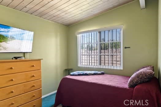 17059 E Groverdale St, Covina, CA 91722 - carpeted bedroom with vaulted ceiling and wood ceiling