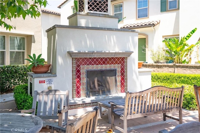28 Sembrio St, Rancho Mission Viejo, CA 92694 - view of patio / terrace featuring an outdoor living space with a fireplace