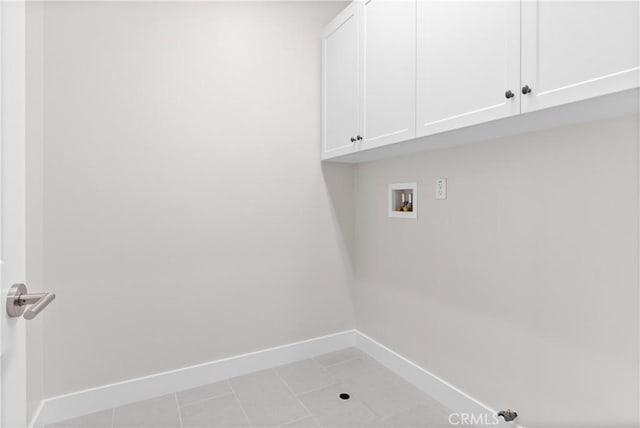 28 Sembrio St, Rancho Mission Viejo, CA 92694 - laundry area featuring cabinet space, washer hookup, and light tile patterned floors