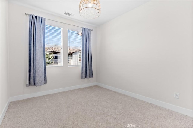28 Sembrio St, Rancho Mission Viejo, CA 92694 - empty room with a chandelier and carpet