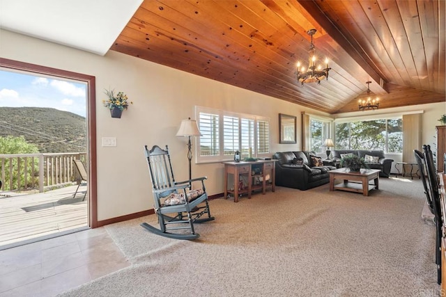 1480 Round Potrero Rd, Potrero, CA 91963 - living room with a chandelier, a mountain view, carpet, wooden ceiling, and tile patterned flooring