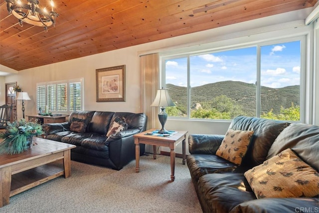 1480 Round Potrero Rd, Potrero, CA 91963 - living room with a mountain view, carpet floors, a chandelier, and lofted ceiling