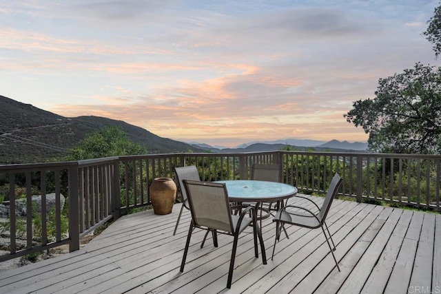 1480 Round Potrero Rd, Potrero, CA 91963 - wooden deck featuring a mountain view and outdoor dining space