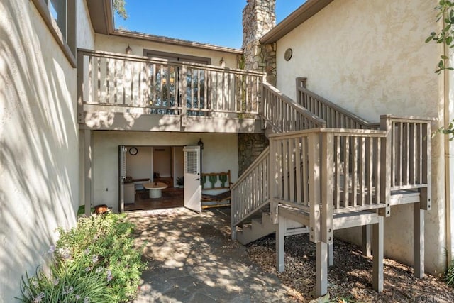 1480 Round Potrero Rd, Potrero, CA 91963 - rear view of property featuring stairs, stucco siding, a wooden deck, and a patio
