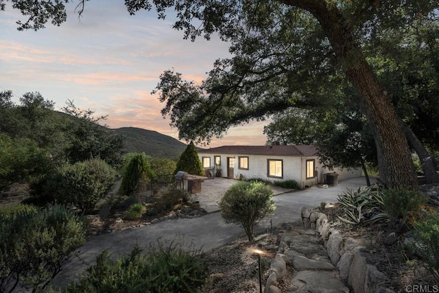 1480 Round Potrero Rd, Potrero, CA 91963 - view of front of home with stucco siding and a mountain view