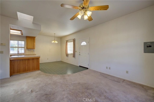 355 Via Vicente, Nipomo, CA 93444 - entrance foyer with light colored carpet, healthy amount of natural light, a chandelier, and ceiling fan