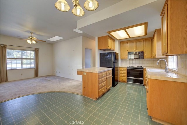 355 Via Vicente, Nipomo, CA 93444 - kitchen with black appliances, tile countertops, light colored carpet, open floor plan, and a ceiling fan