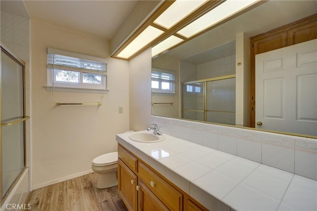 355 Via Vicente, Nipomo, CA 93444 - full bath featuring wood finished floors, vanity, and combined bath / shower with glass door