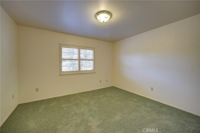 355 Via Vicente, Nipomo, CA 93444 - unfurnished room with dark carpet and baseboards