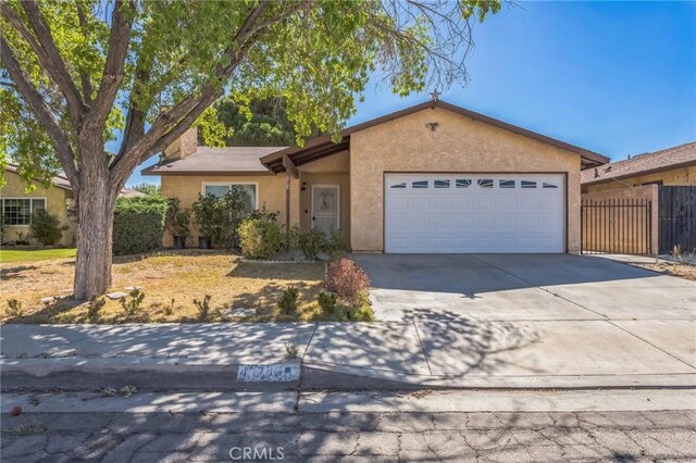 44740 Jefferson Ct, Lancaster, CA 93535 - ranch-style home with an attached garage, stucco siding, and driveway