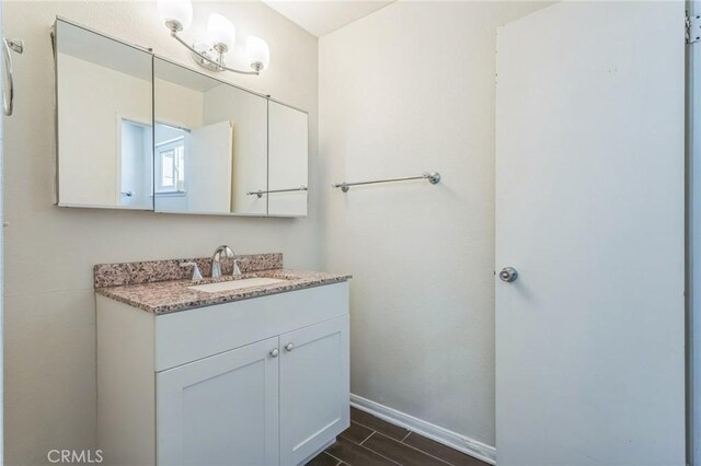 44740 Jefferson Ct, Lancaster, CA 93535 - bathroom featuring vanity and wood finished floors