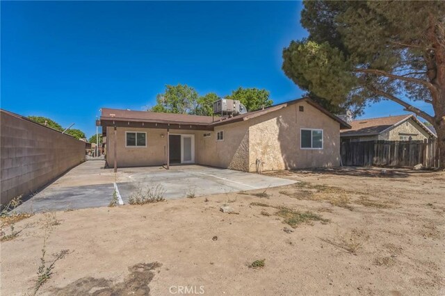 44740 Jefferson Ct, Lancaster, CA 93535 - rear view of property with a patio area and stucco siding