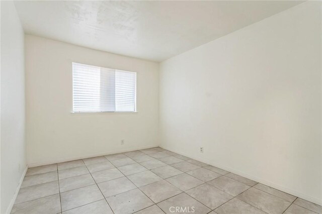 44740 Jefferson Ct, Lancaster, CA 93535 - empty room with light tile patterned floors