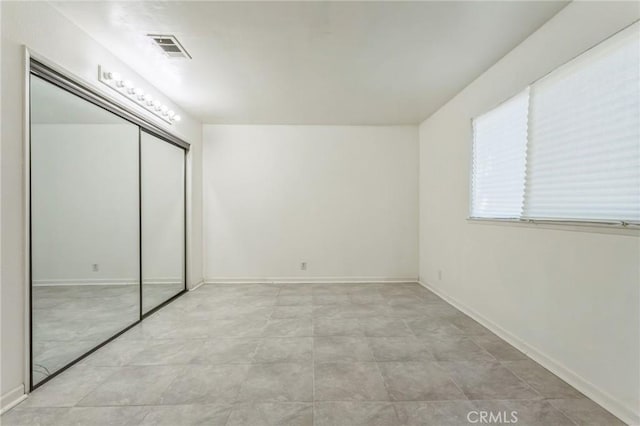 44740 Jefferson Ct, Lancaster, CA 93535 - unfurnished bedroom featuring a closet and baseboards