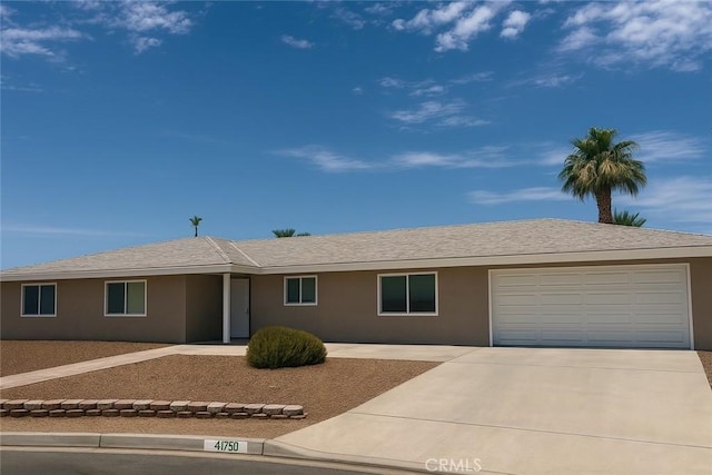 41150 Nona Ct, Hemet, CA 92544 - single story home featuring driveway, an attached garage, and stucco siding