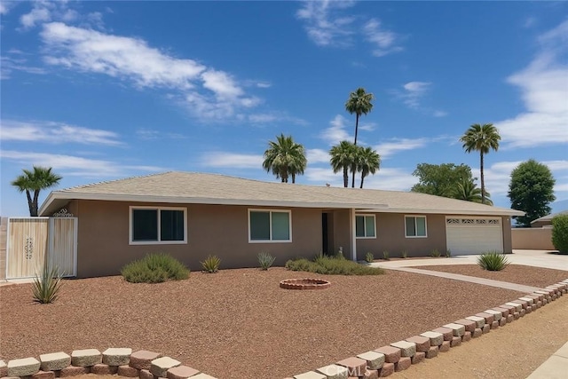 41150 Nona Ct, Hemet, CA 92544 - ranch-style home featuring a garage, stucco siding, and driveway