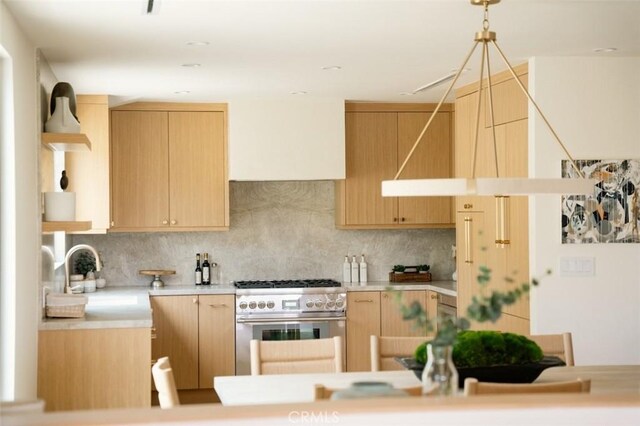 13817 Valley Vista Blvd, Sherman Oaks, CA 91423 - kitchen featuring stainless steel stove, light brown cabinets, light countertops, decorative backsplash, and decorative light fixtures