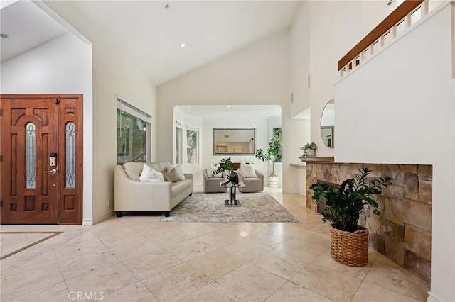 24622 Cresta Ct, Laguna Hills, CA 92653 - entrance foyer featuring high vaulted ceiling and baseboards