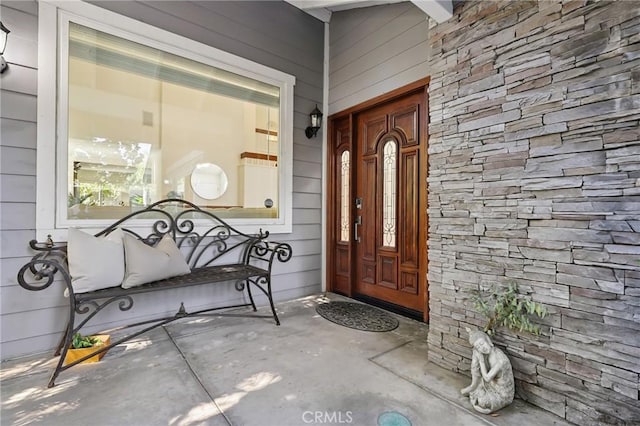 24622 Cresta Ct, Laguna Hills, CA 92653 - view of exterior entry featuring stone siding