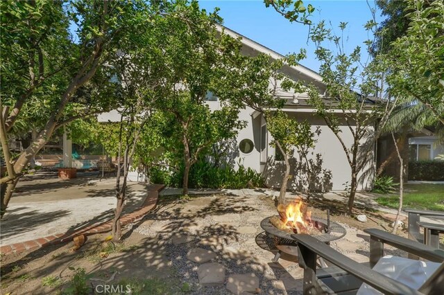 24622 Cresta Ct, Laguna Hills, CA 92653 - view of patio / terrace featuring a fire pit