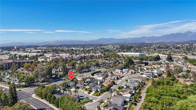 24622 Cresta Ct, Laguna Hills, CA 92653 - aerial overview of property's location with a mountainous background