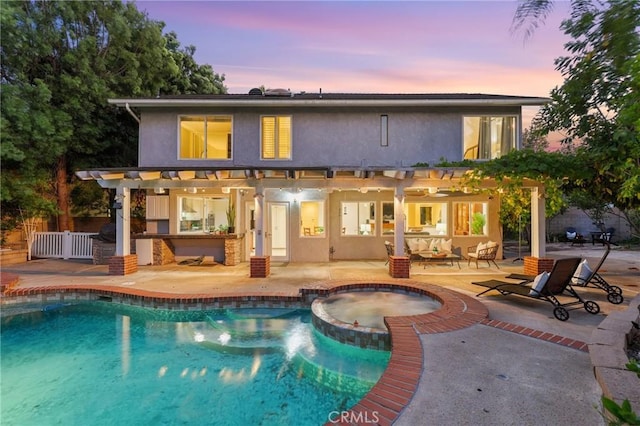 24622 Cresta Ct, Laguna Hills, CA 92653 - back of house with a pergola, stucco siding, and a patio area