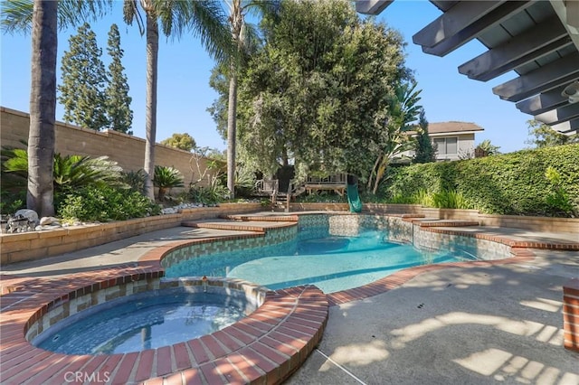 24622 Cresta Ct, Laguna Hills, CA 92653 - view of pool featuring a pool with connected hot tub, a fenced backyard, and a patio area