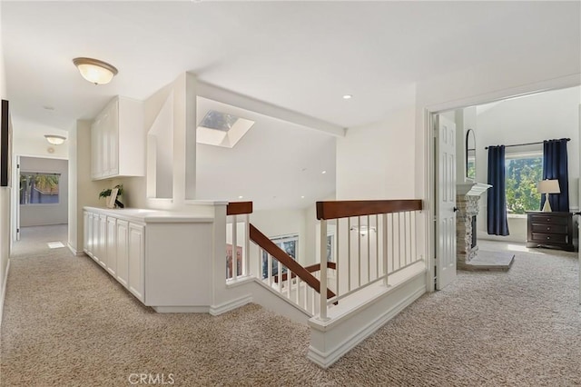 24622 Cresta Ct, Laguna Hills, CA 92653 - hallway with light carpet and an upstairs landing