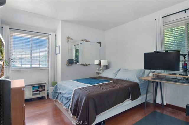 10254 Catalina Pl, Rancho Cucamonga, CA 91730 - bedroom featuring multiple windows and wood finished floors