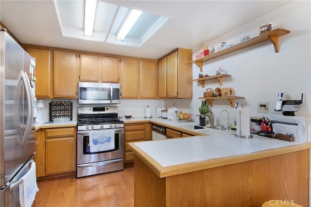 10254 Catalina Pl, Rancho Cucamonga, CA 91730 - kitchen with appliances with stainless steel finishes, open shelves, a peninsula, light wood-style floors, and tile countertops