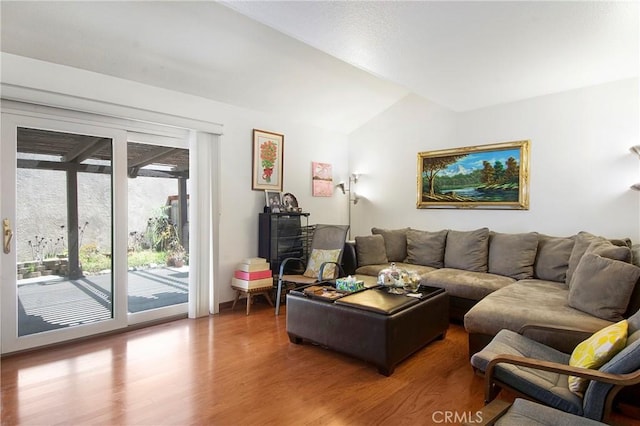 10254 Catalina Pl, Rancho Cucamonga, CA 91730 - living area featuring vaulted ceiling and wood finished floors