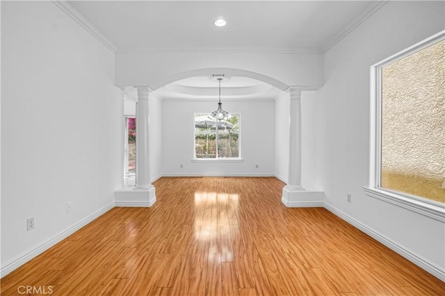 17787 Merridy St, Northridge, CA 91325 - spare room with decorative columns, light wood-type flooring, arched walkways, ornamental molding, and recessed lighting