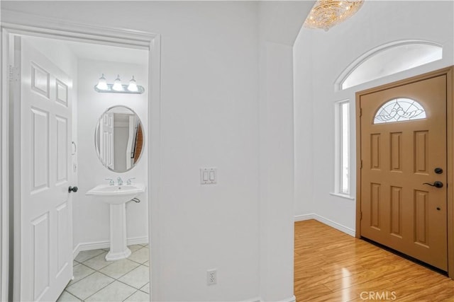 17787 Merridy St, Northridge, CA 91325 - foyer with baseboards and light tile patterned floors