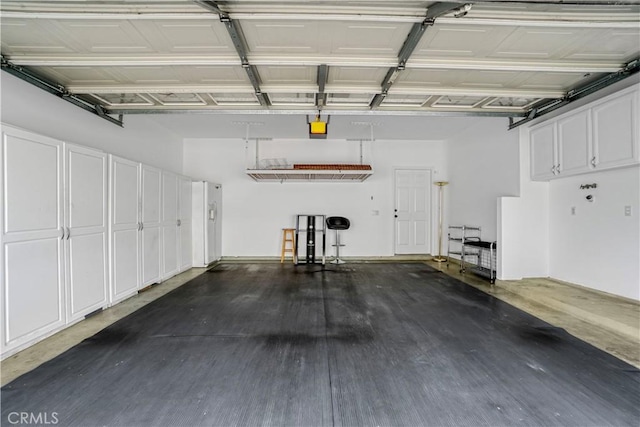 17787 Merridy St, Northridge, CA 91325 - garage featuring a garage door opener