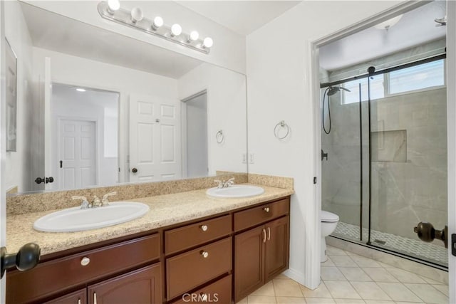 17787 Merridy St, Northridge, CA 91325 - full bathroom featuring a stall shower, double vanity, and tile patterned floors