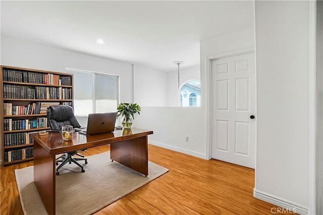 17787 Merridy St, Northridge, CA 91325 - home office with light wood-style flooring and recessed lighting