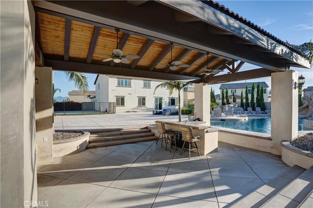 11715 Periwinkle Pl, Jurupa Valley, CA 91752 - view of patio / terrace with a ceiling fan and an outdoor pool