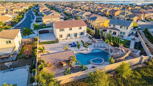 11715 Periwinkle Pl, Jurupa Valley, CA 91752 - aerial perspective of suburban area featuring a pool area
