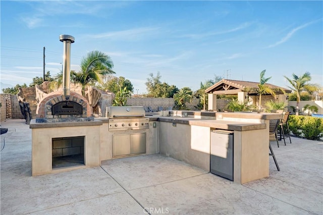 11715 Periwinkle Pl, Jurupa Valley, CA 91752 - view of patio / terrace featuring area for grilling