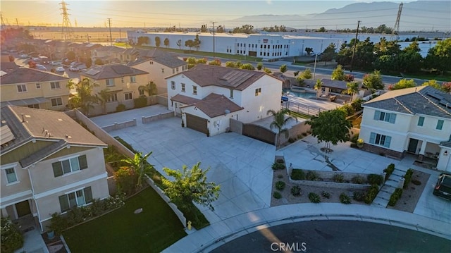 11715 Periwinkle Pl, Jurupa Valley, CA 91752 - aerial perspective of suburban area featuring a mountainous background