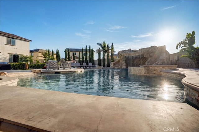 11715 Periwinkle Pl, Jurupa Valley, CA 91752 - community pool featuring a patio