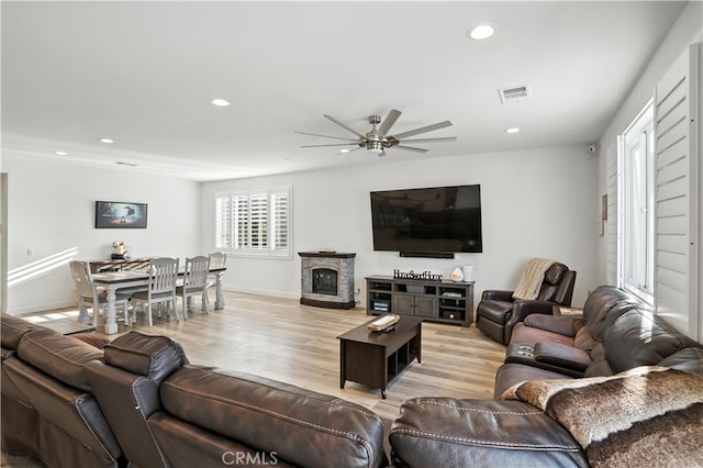 11715 Periwinkle Pl, Jurupa Valley, CA 91752 - living area featuring recessed lighting, ceiling fan, and light wood-style flooring