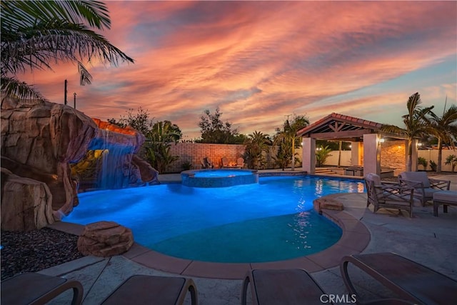 11715 Periwinkle Pl, Jurupa Valley, CA 91752 - view of pool with a gazebo, a patio, a fenced backyard, and a pool with connected hot tub